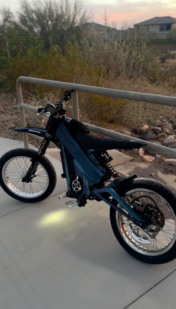 Talaria with the chrome silver supermoto wheelset installed, side view