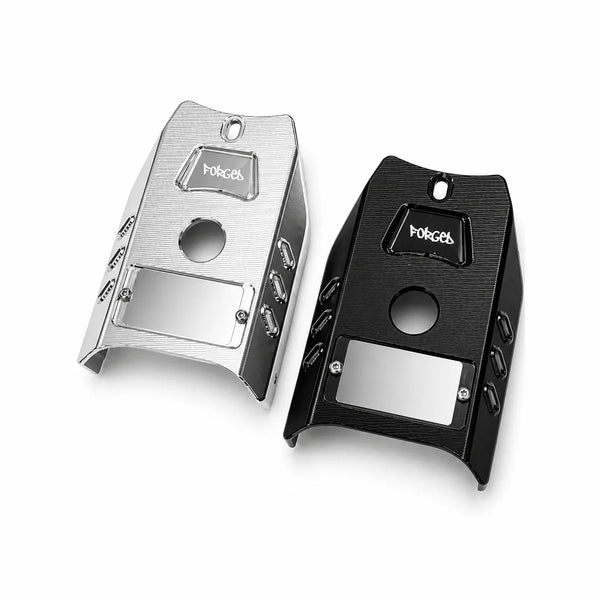 Talaria XXX metal ignition covers in Silver Chrome and Glossy Black with clear window